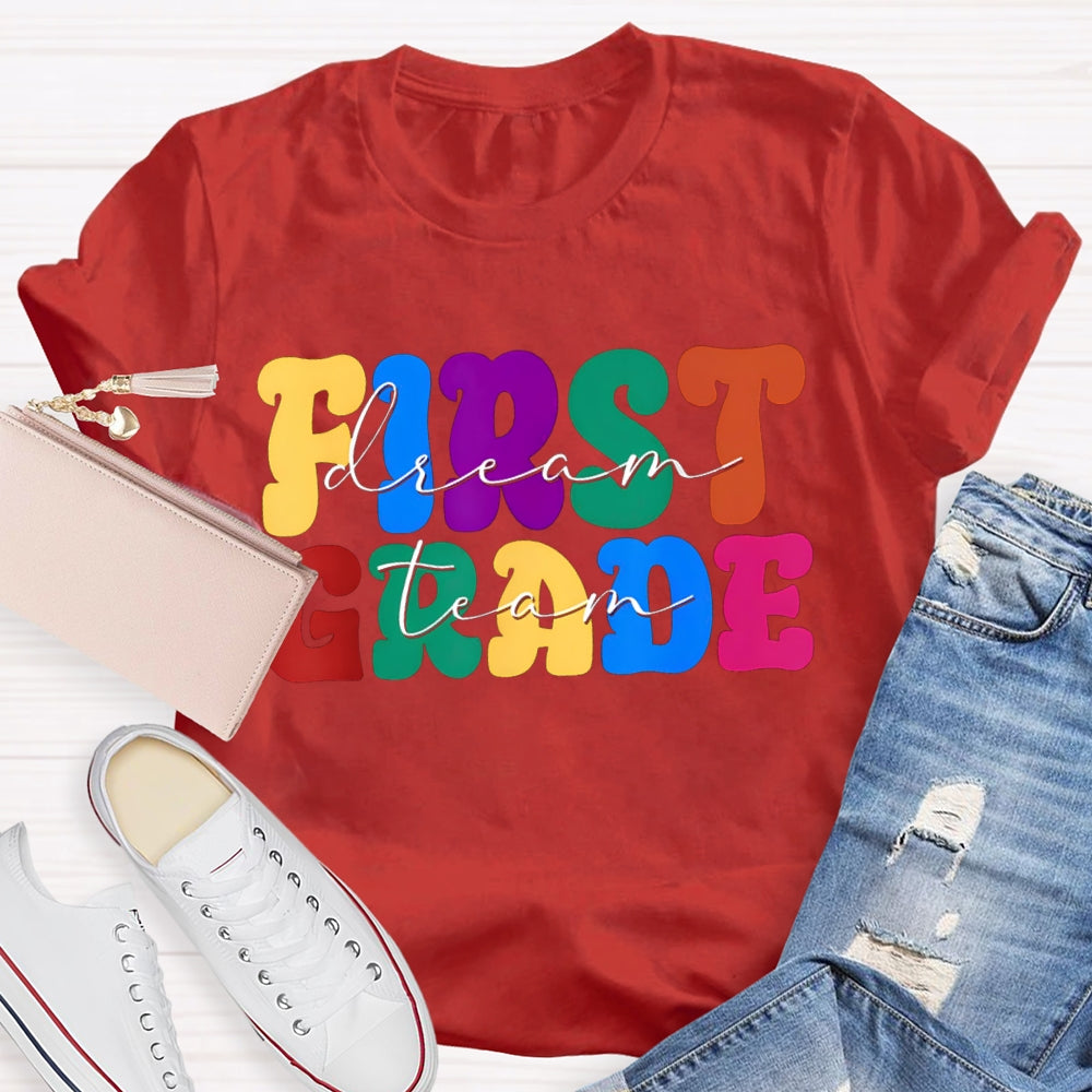 Personalized Grade First Grade Colored Letters Teacher T-shirt