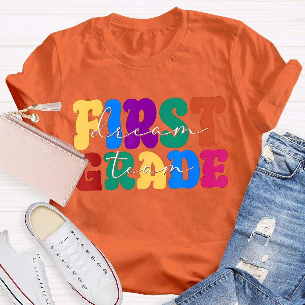 Personalized Grade First Grade Colored Letters Teacher T-shirt
