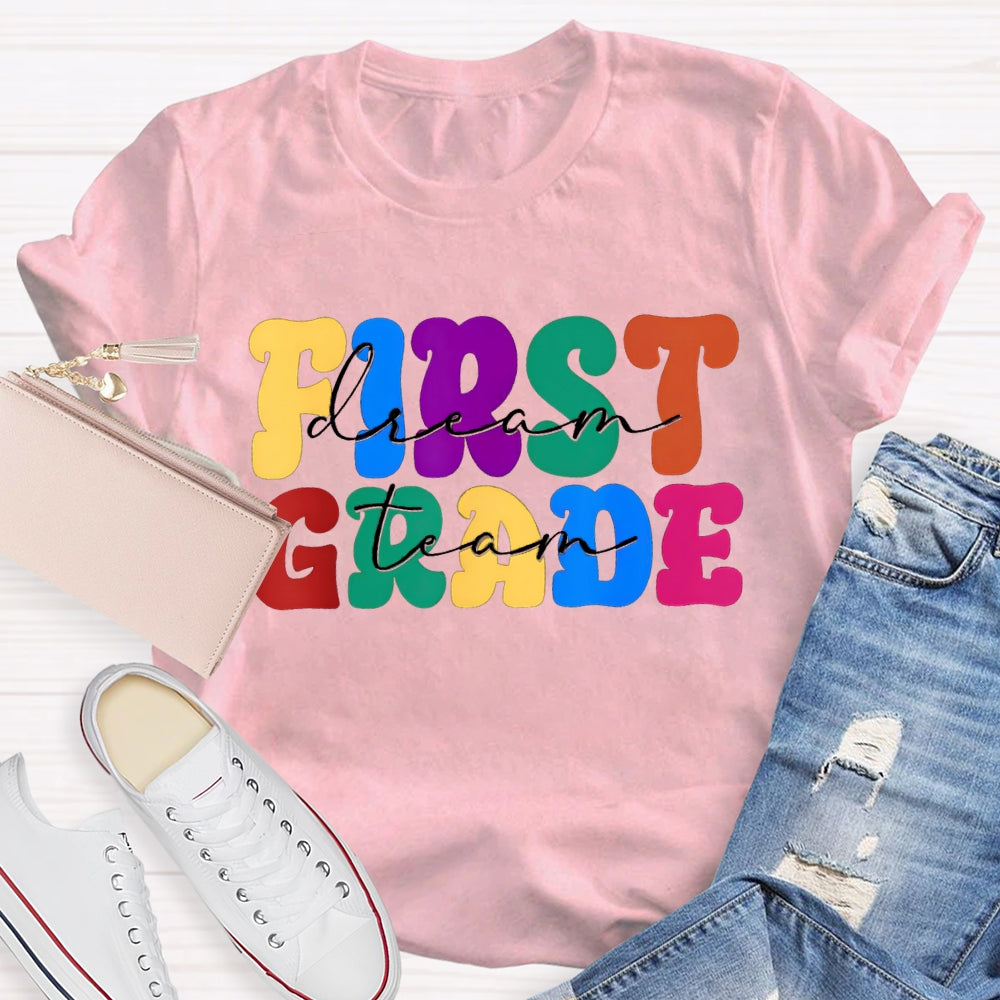 Personalized Grade First Grade Colored Letters Teacher T-shirt