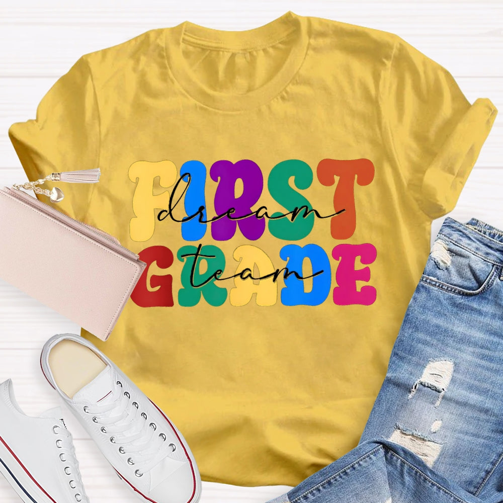 Personalized Grade First Grade Colored Letters Teacher T-shirt