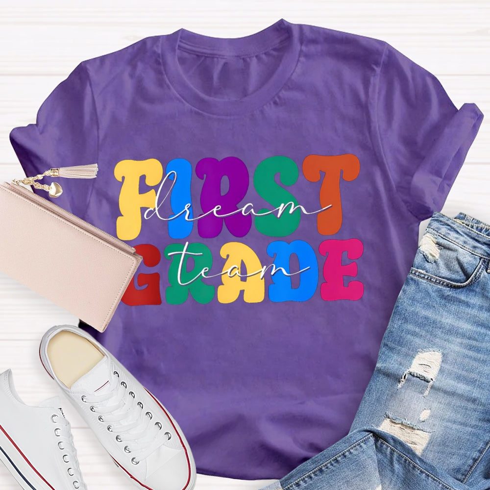 Personalized Grade First Grade Colored Letters Teacher T-shirt