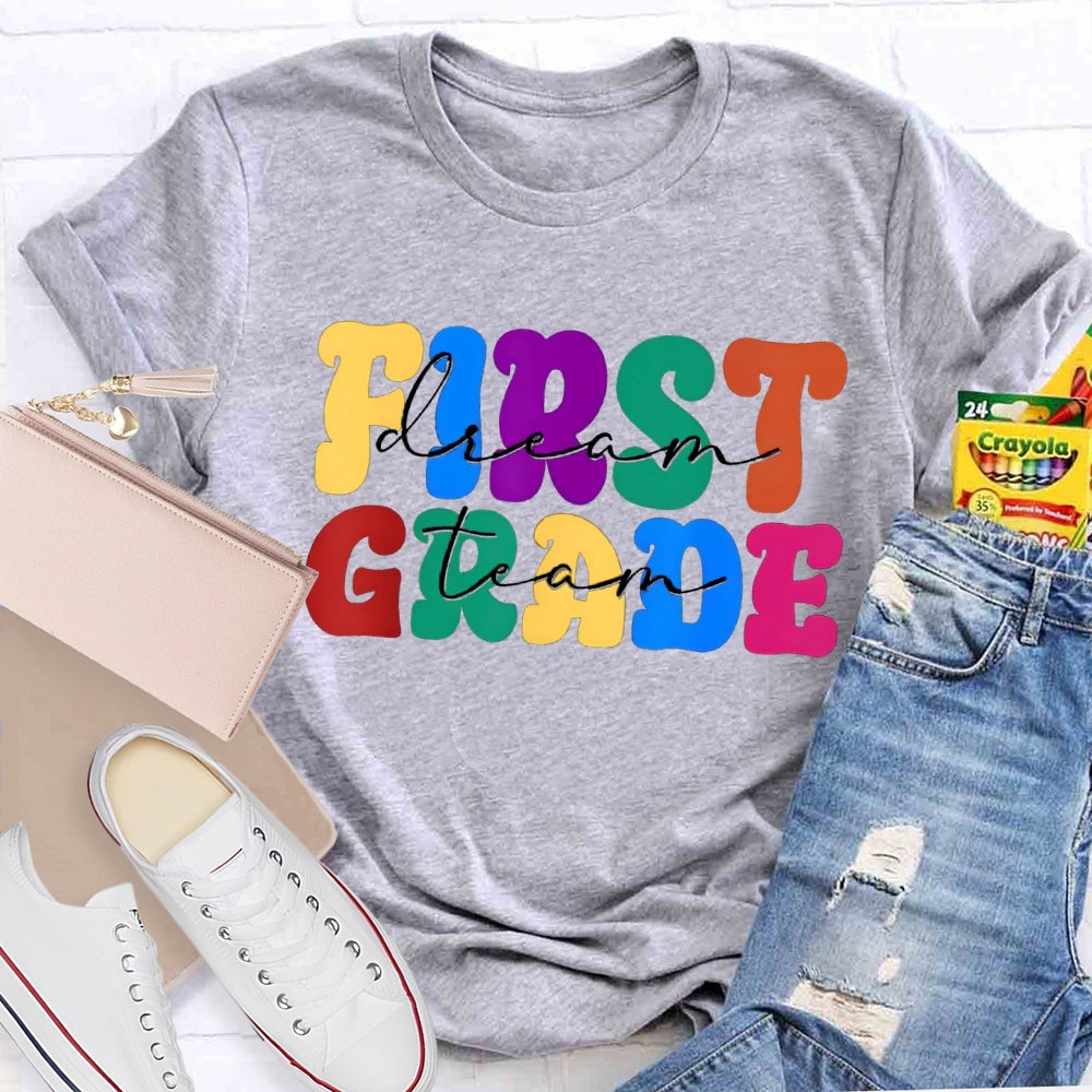 Personalized Grade First Grade Colored Letters Teacher T-shirt