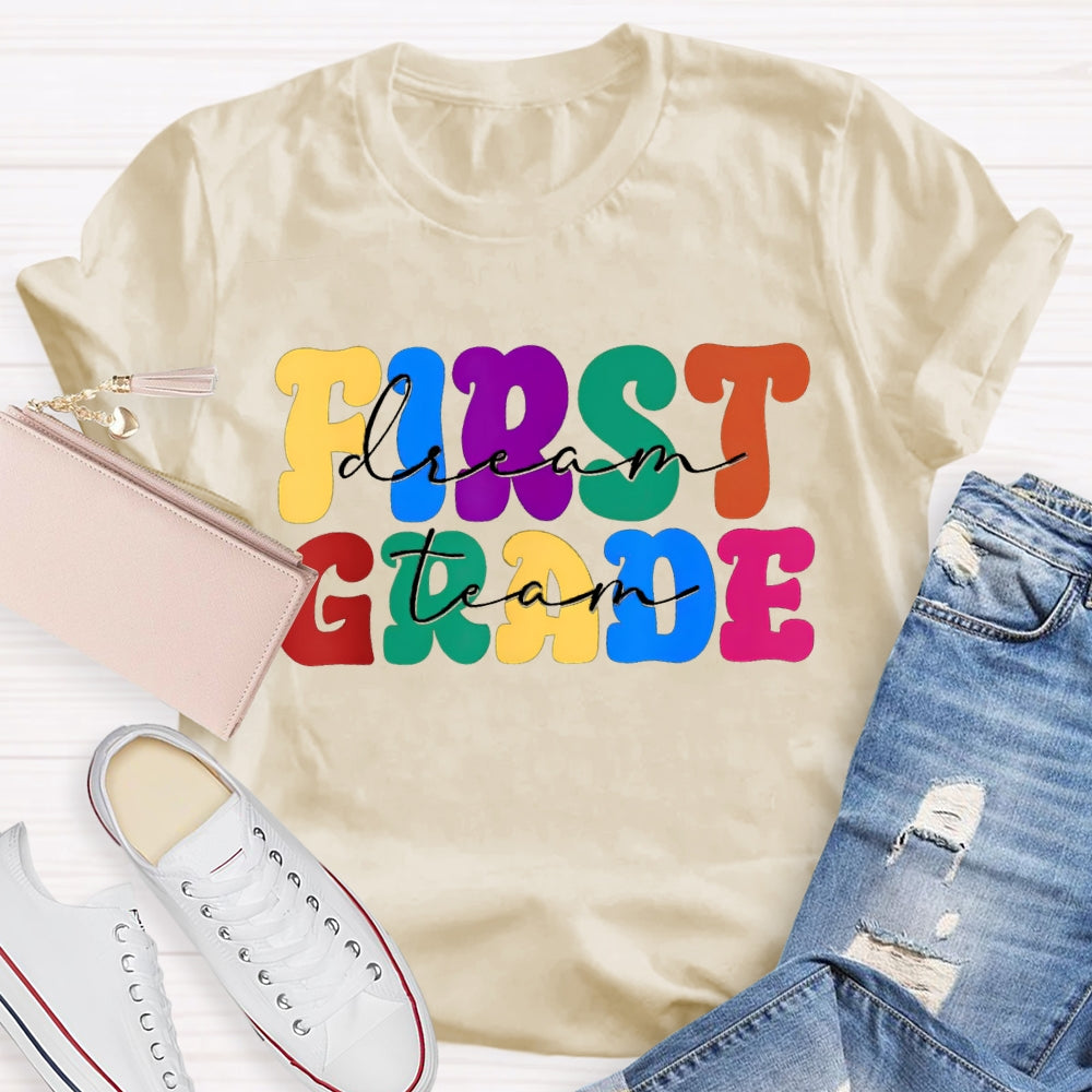 Personalized Grade First Grade Colored Letters Teacher T-shirt
