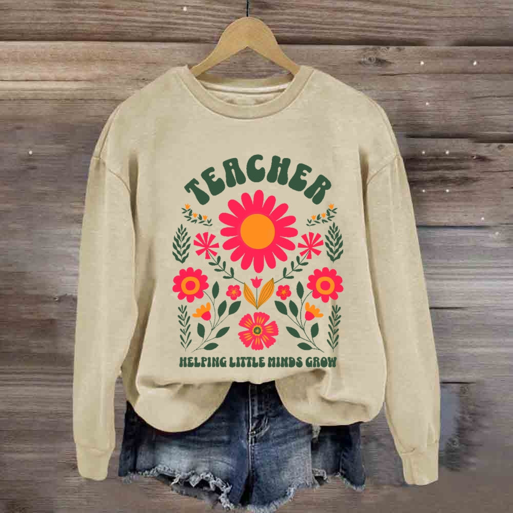 Floral Teacher Helping Little Minds Grow Sweatshirt