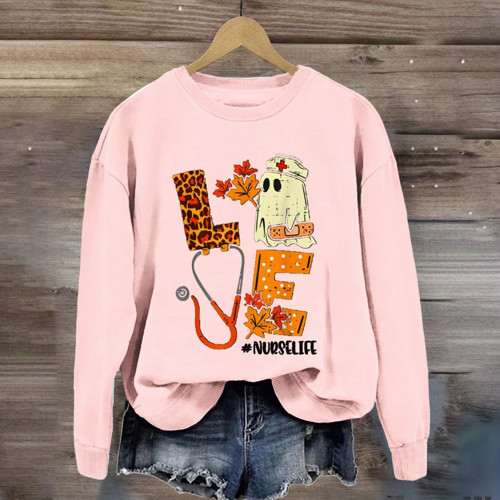 Love School Nurse Life Leopard Print Font And Maple Leaves sweatshirt