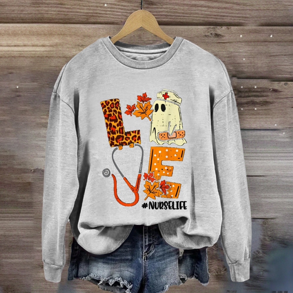 Love School Nurse Life Leopard Print Font And Maple Leaves sweatshirt