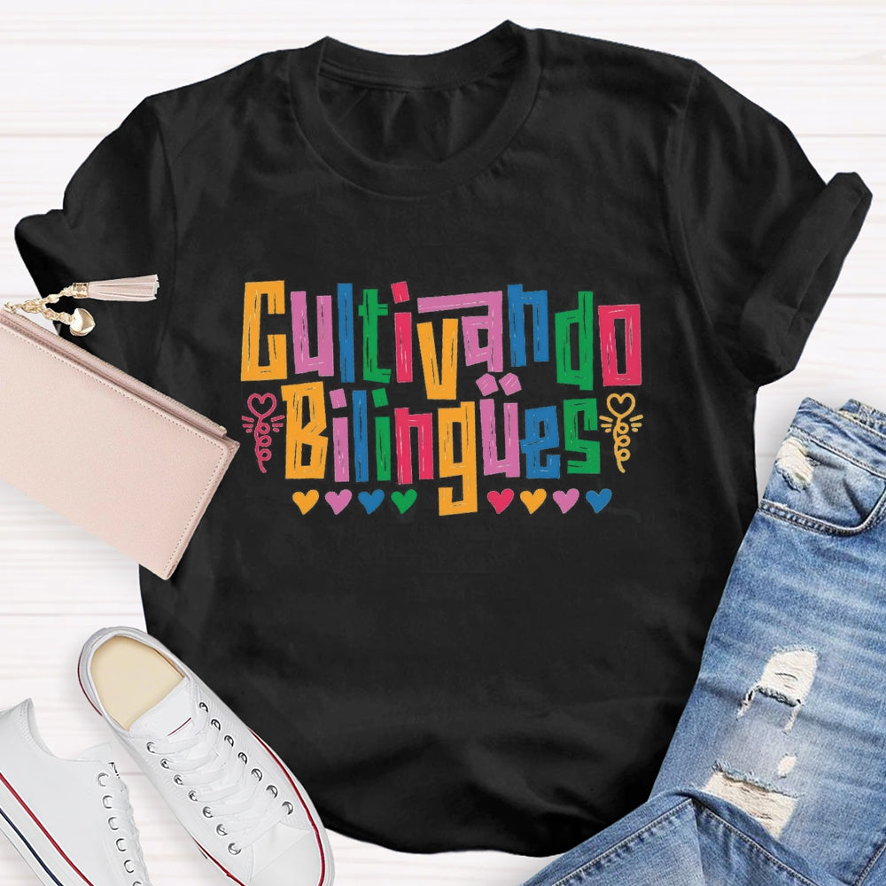 Cultivando Bilingües Bilingual Colored Heart T-shirt