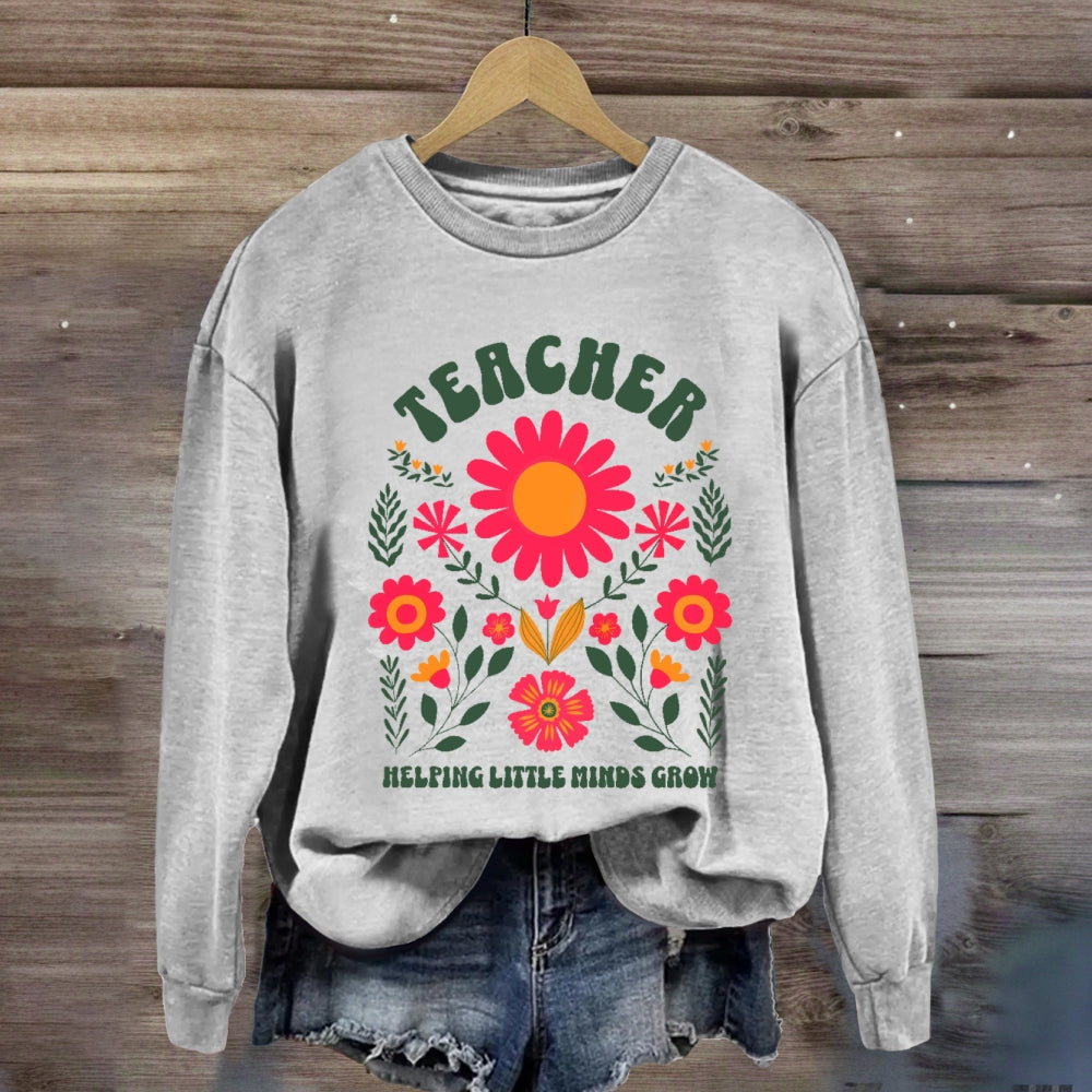 Floral Teacher Helping Little Minds Grow Sweatshirt