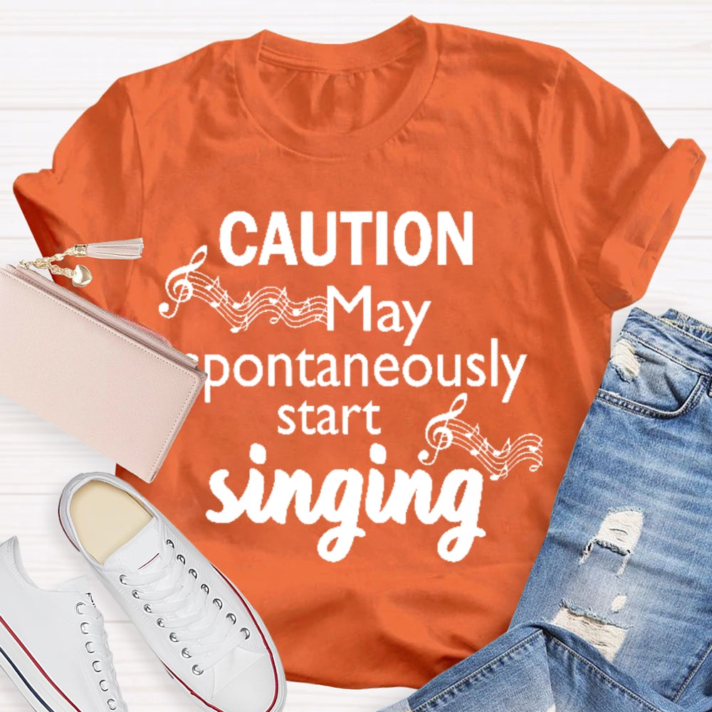 Caution May Spontaneously Start Singing  T-shirt