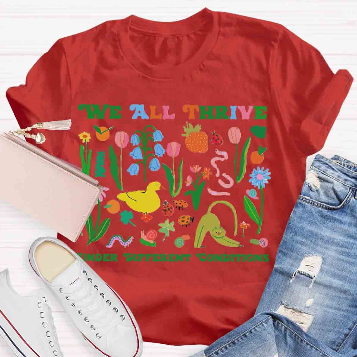 We All Thrive Under Different Conditions Teacher T-Shirt