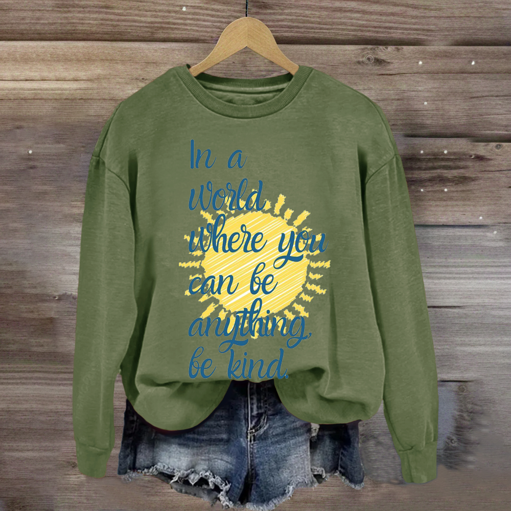 In A World Where You Can Be Anything Be Kind Teacher Sweatshirt