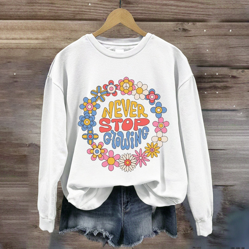 Never Stop Growing Sweatshirt