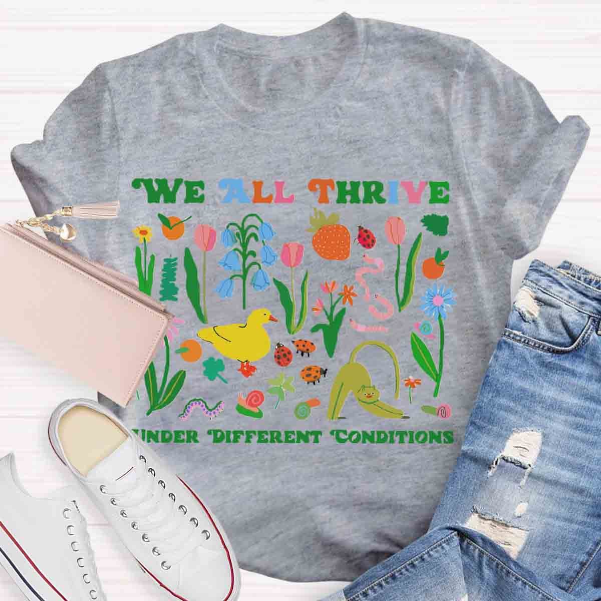 We All Thrive Under Different Conditions Teacher T-Shirt