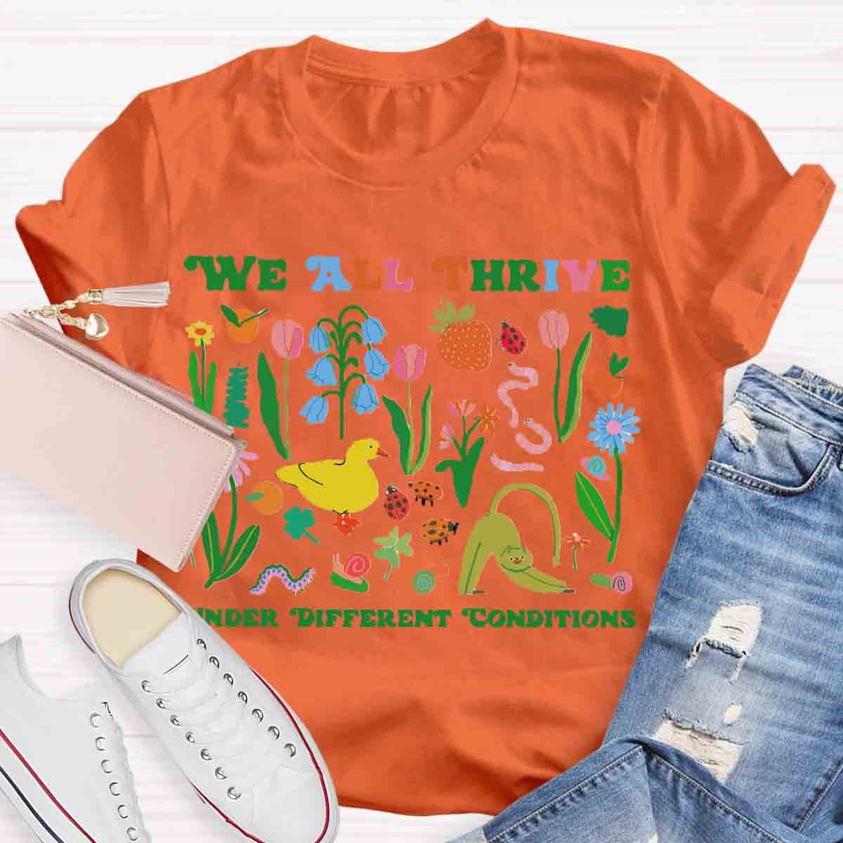 We All Thrive Under Different Conditions Teacher T-Shirt