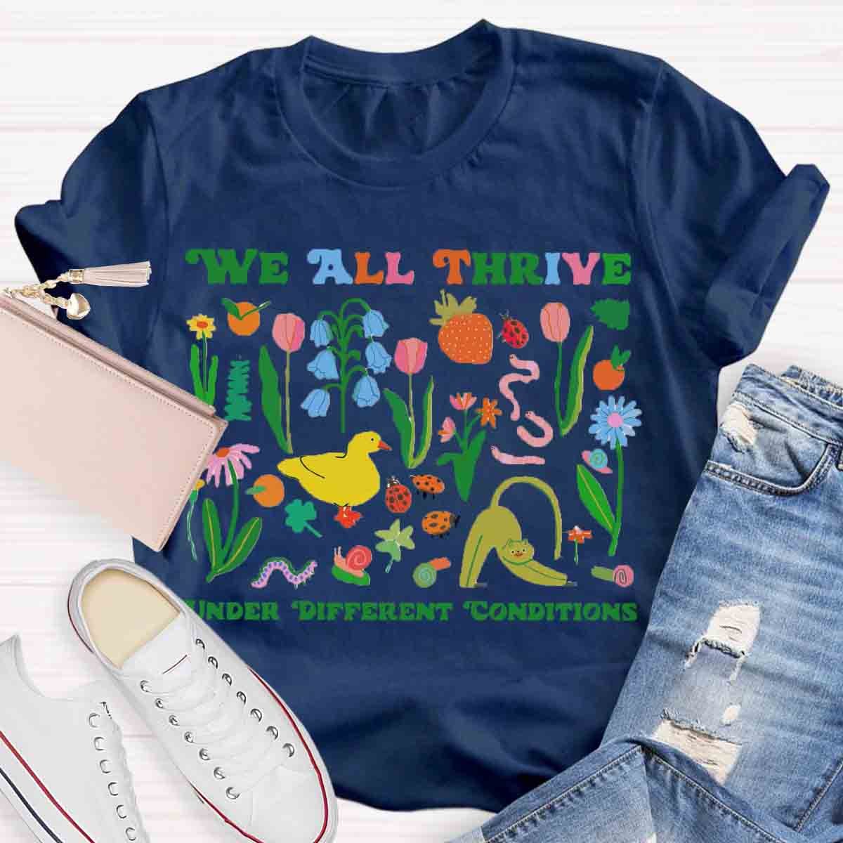 We All Thrive Under Different Conditions Teacher T-Shirt