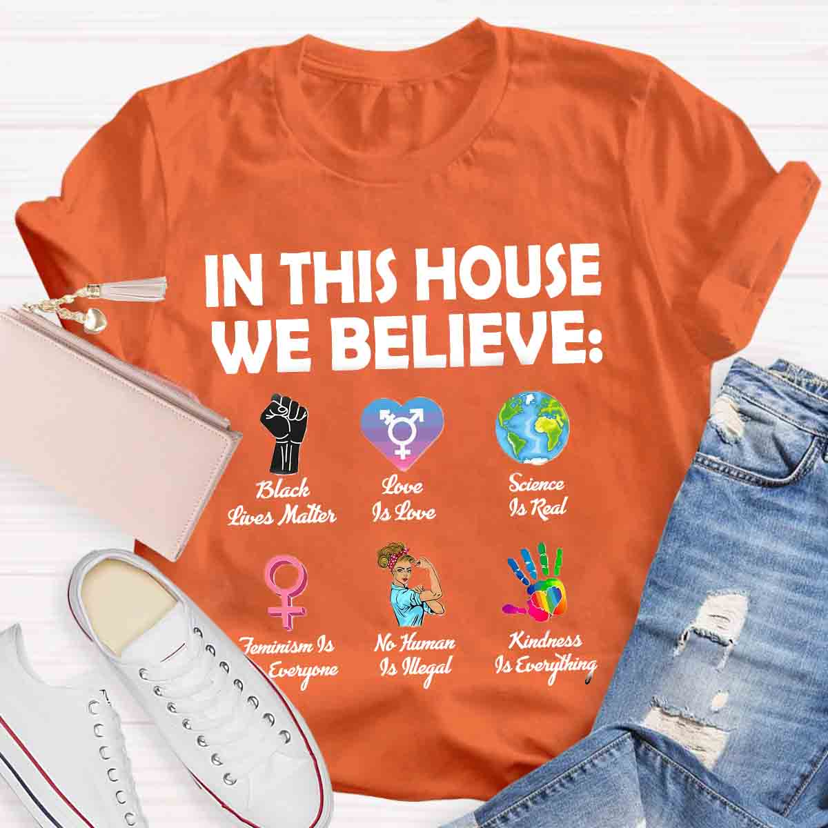 In This House We Believe Teacher T-Shirt