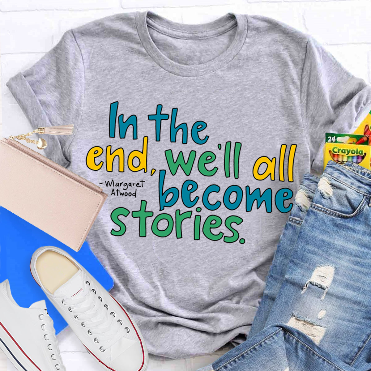 In The End We All Become Stories Teacher T-Shirt