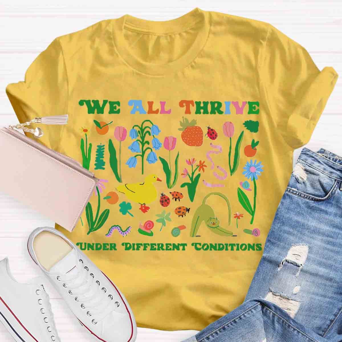 We All Thrive Under Different Conditions Teacher T-Shirt