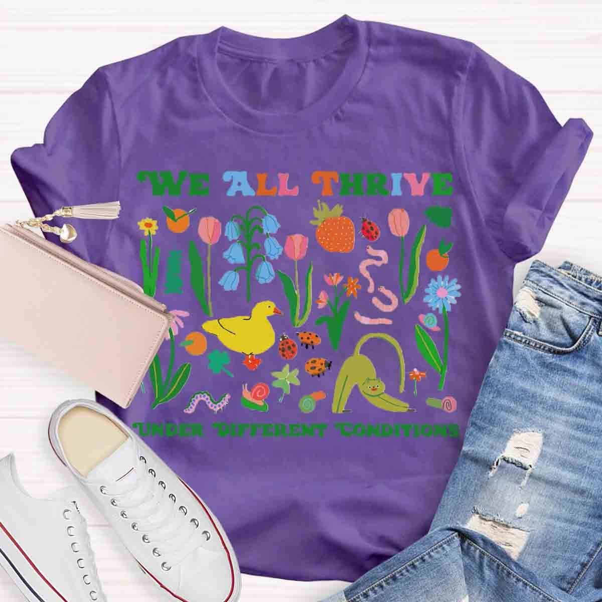 We All Thrive Under Different Conditions Teacher T-Shirt