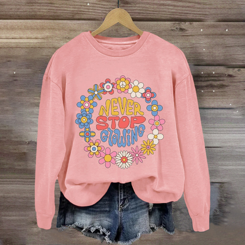 Never Stop Growing Sweatshirt