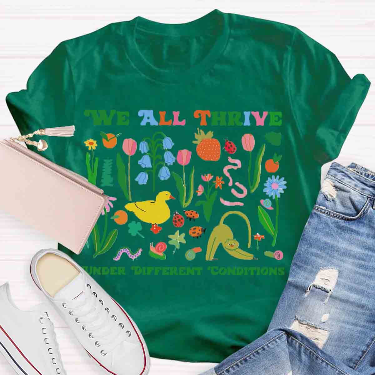 We All Thrive Under Different Conditions Teacher T-Shirt