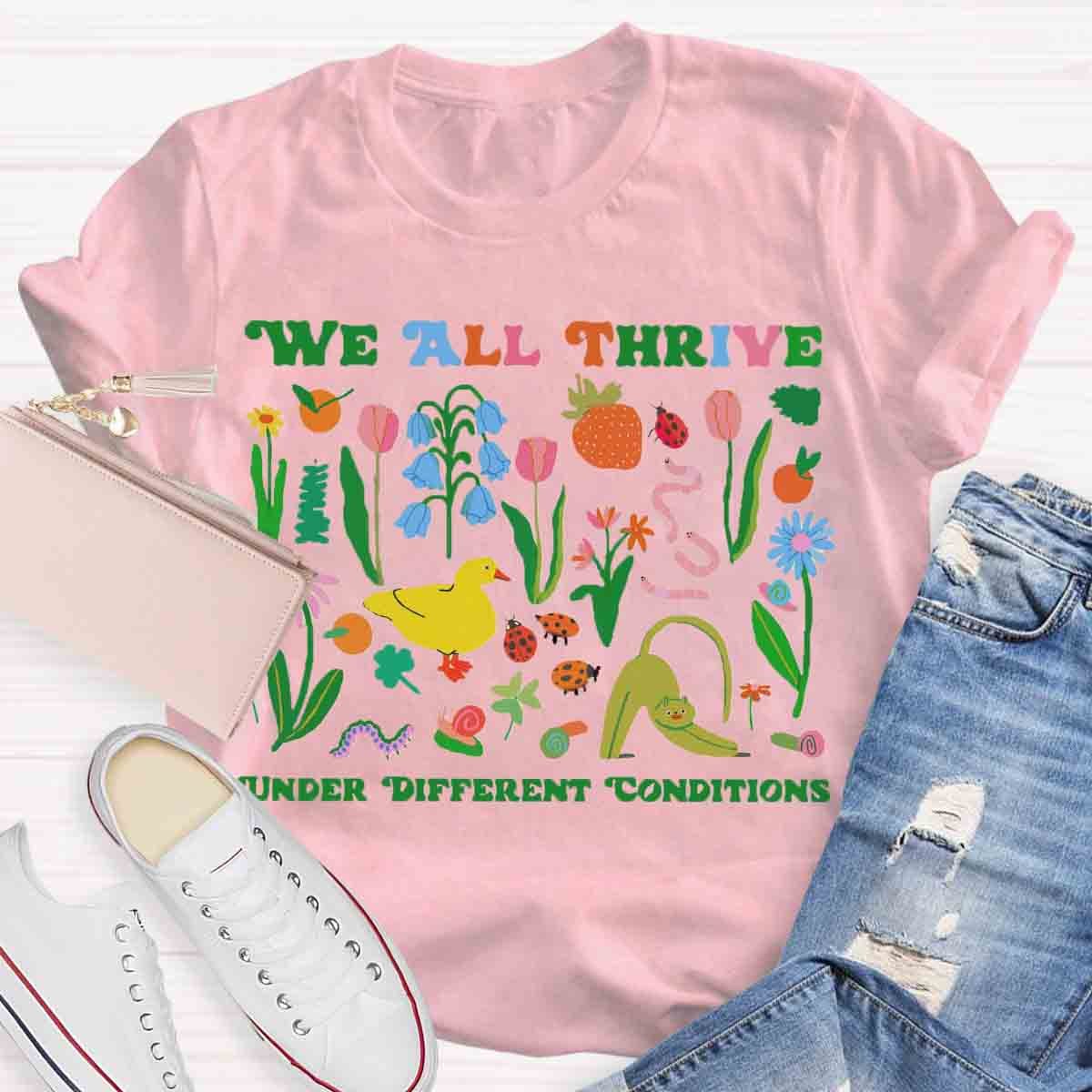 We All Thrive Under Different Conditions Teacher T-Shirt