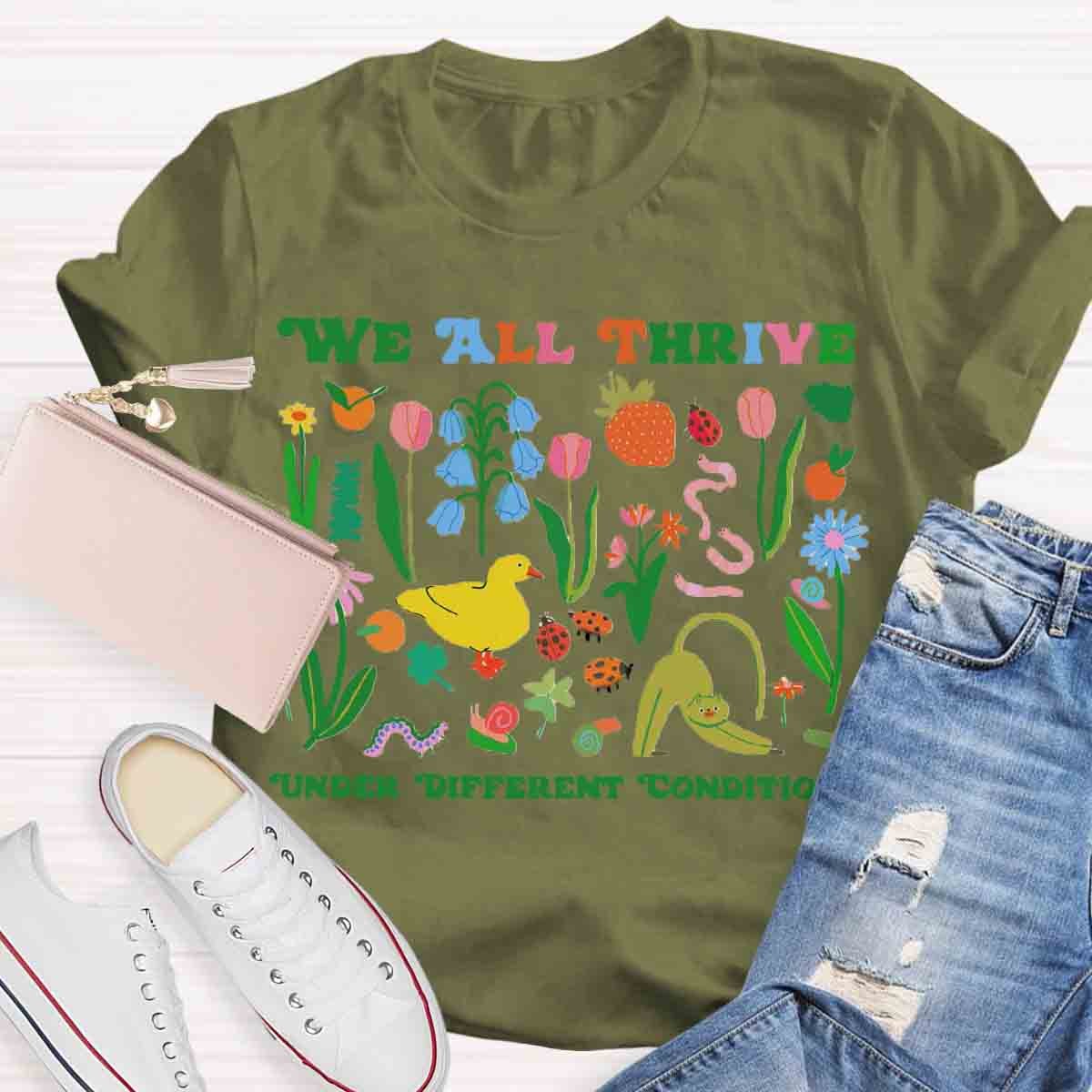 We All Thrive Under Different Conditions Teacher T-Shirt