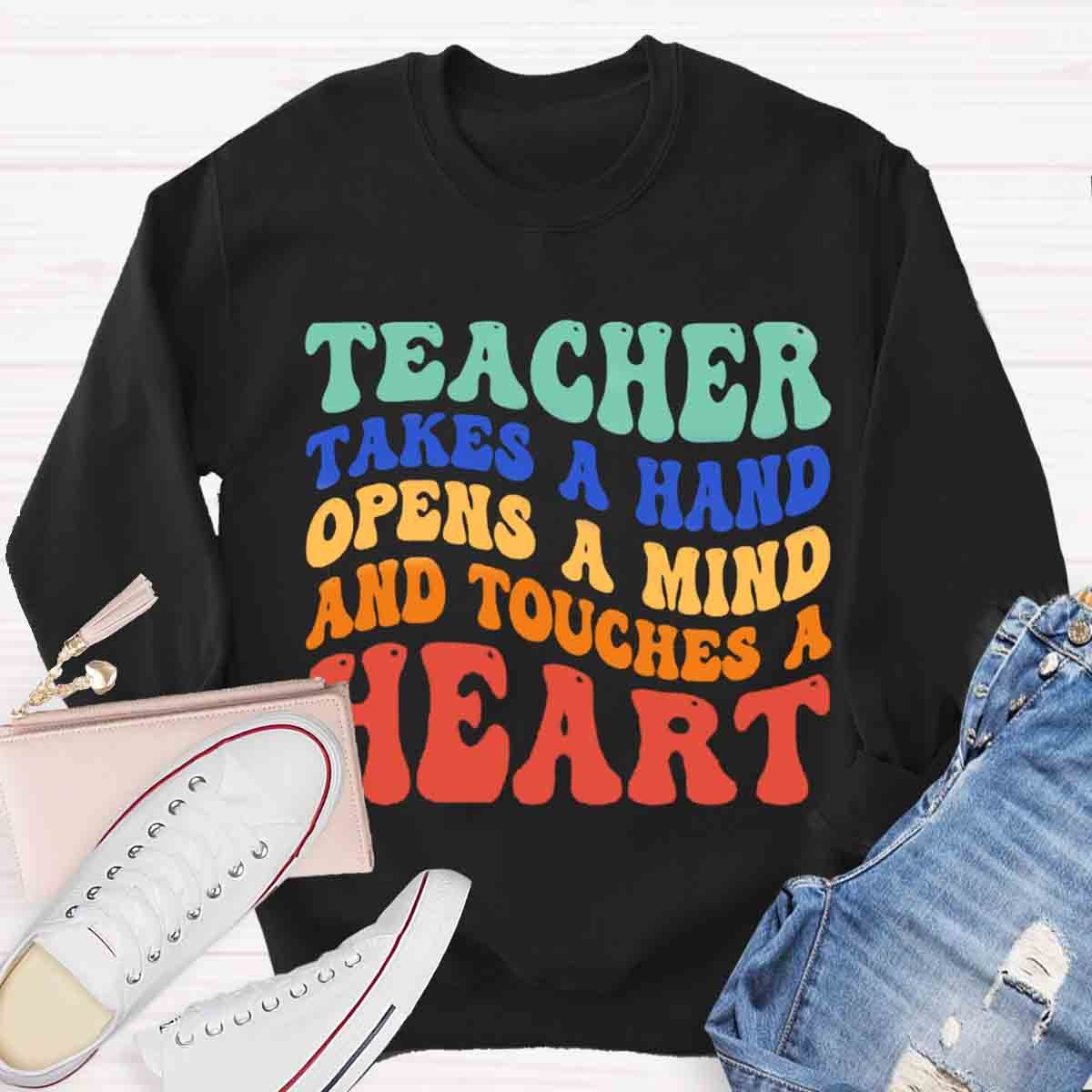 A Teacher Takes A Hand Opens A Mind And Touches A Heart Sweatshirt