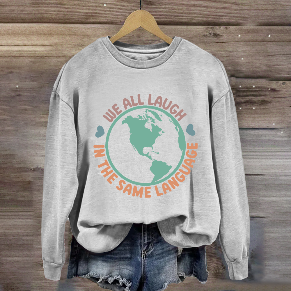 We All Laugh in the Same Language Sweatshirt